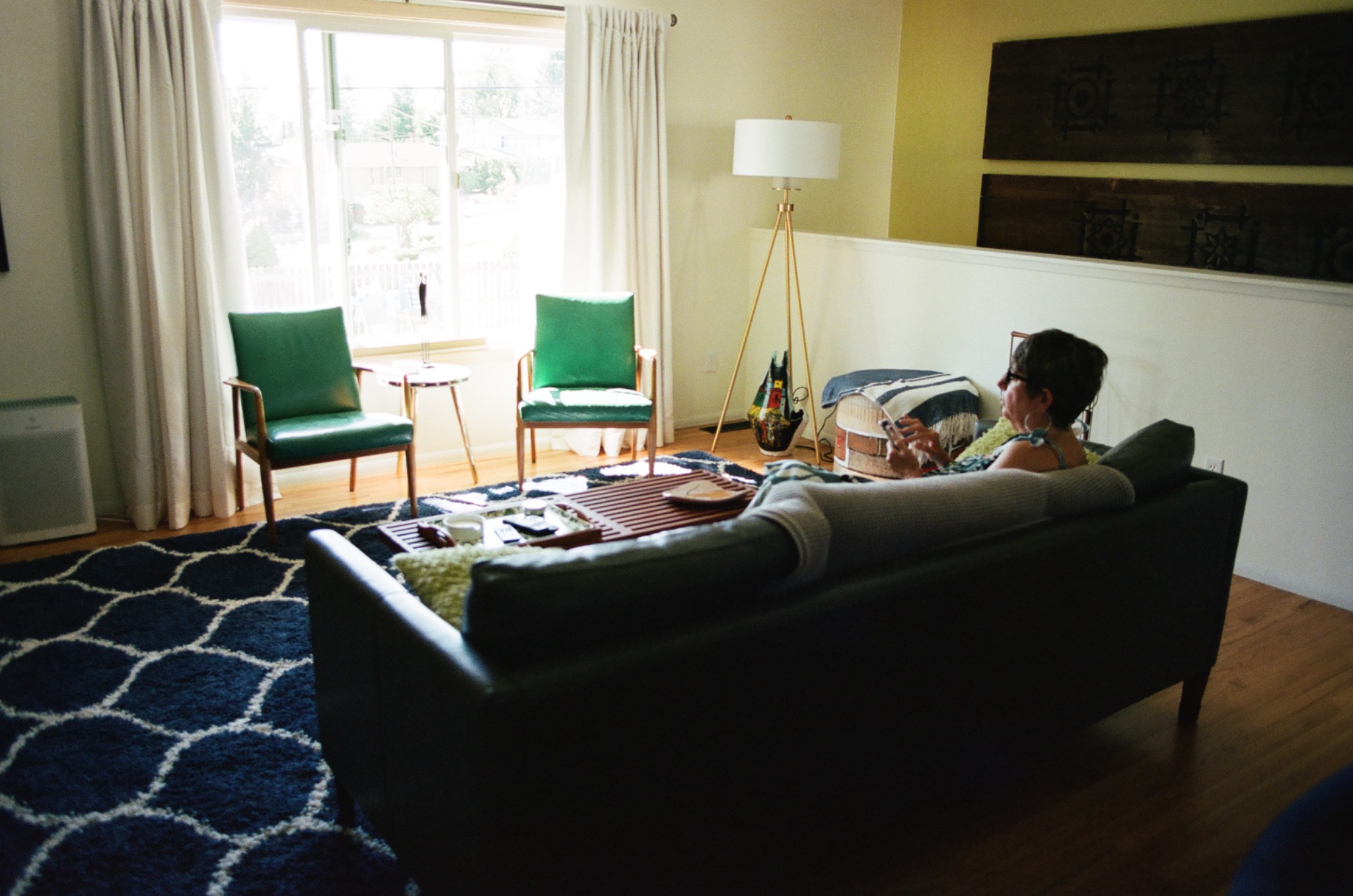 A quiet living room lit by a window