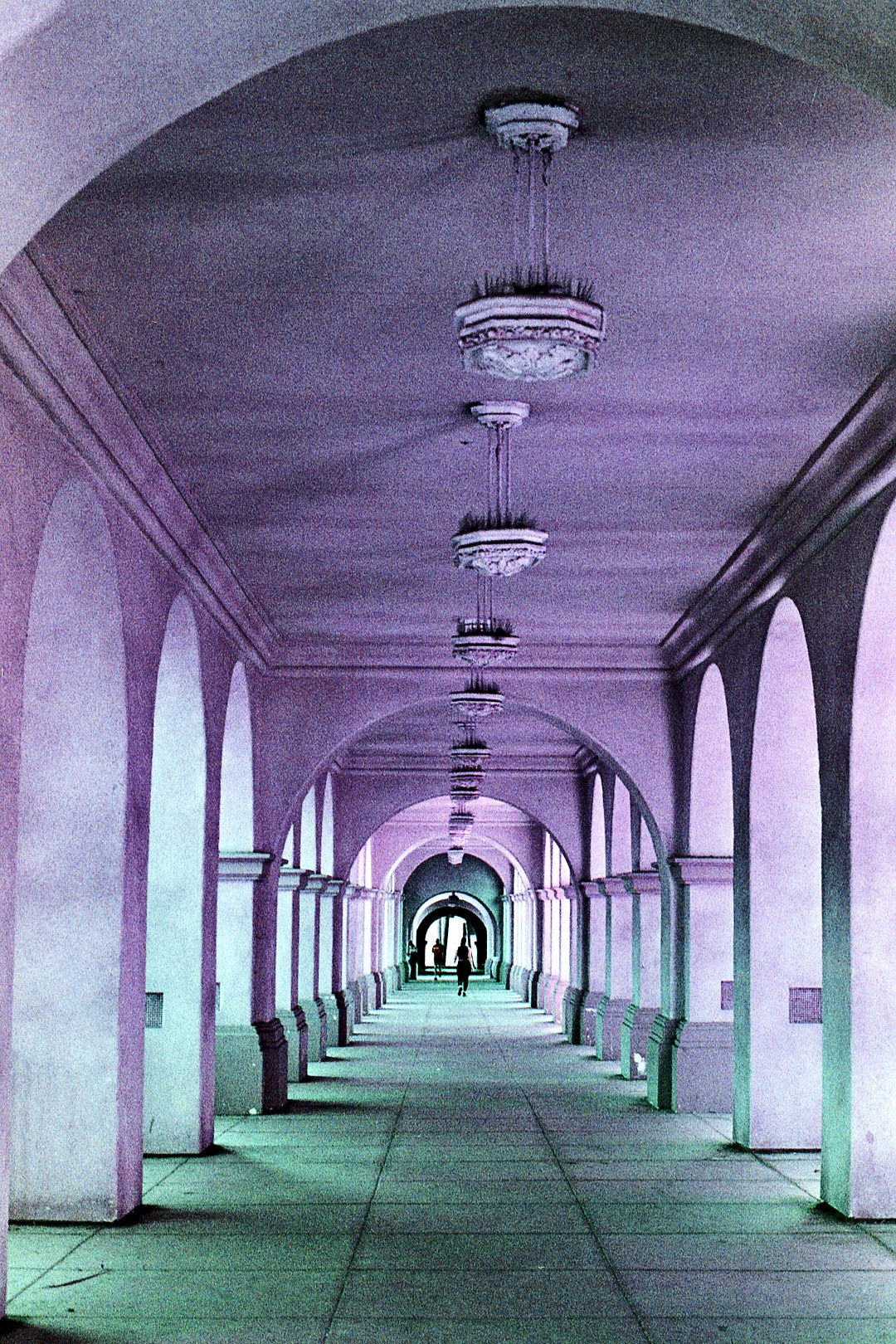 A pastel arcade receding into the distance